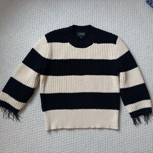 J. Crew Black and Cream Striped Sweater with feather sleeve hem